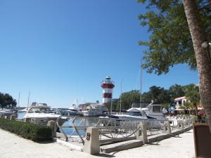 lighthouse and boats